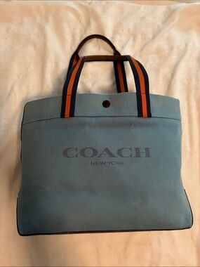 Coach 38” Light Blue Canvas Tote with Striped Navy & Orange Handles original tag